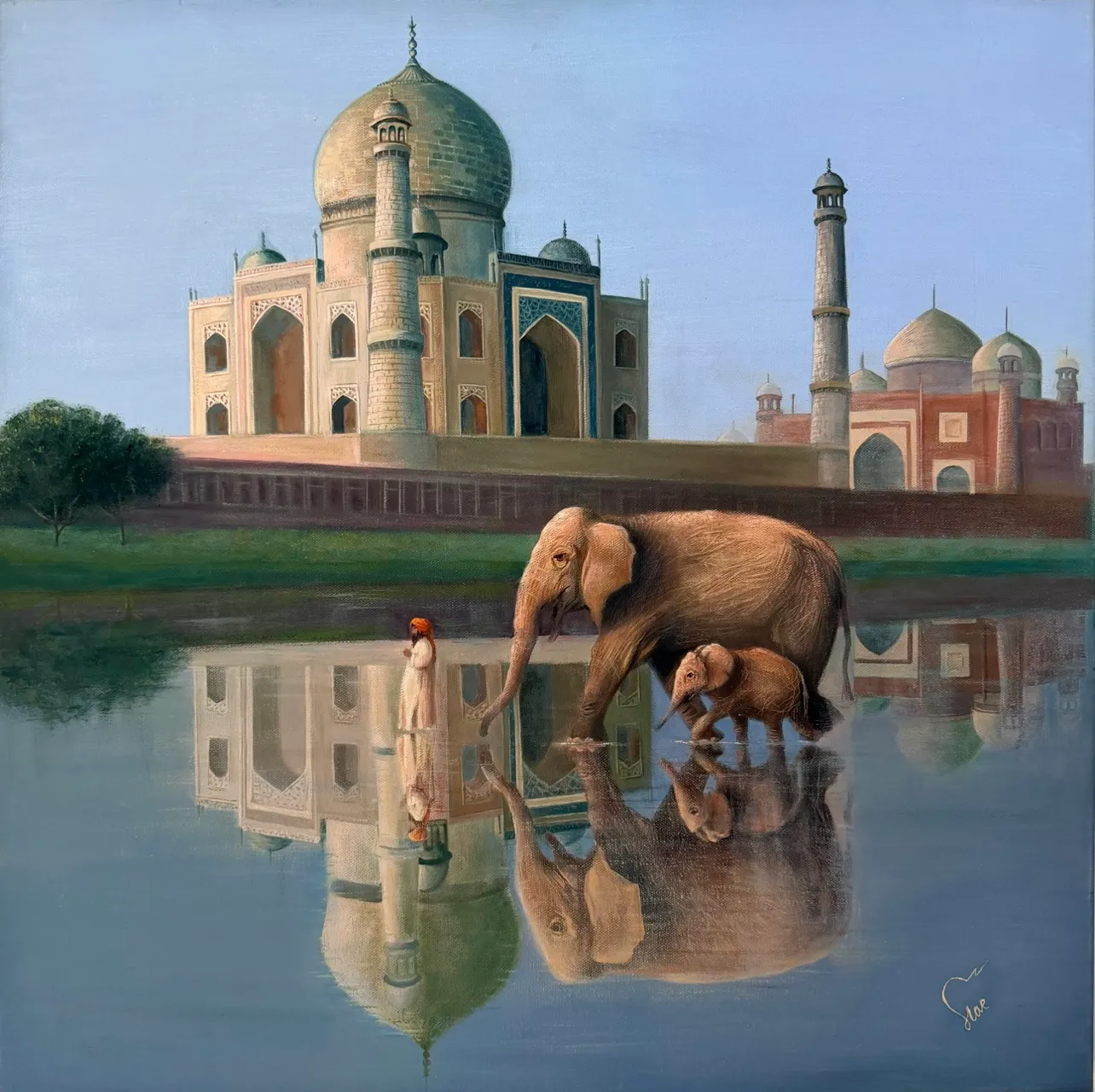 An elephant and calf beside a figure in white, reflected in still water in front of the Taj Mahal beneath a blue sky.